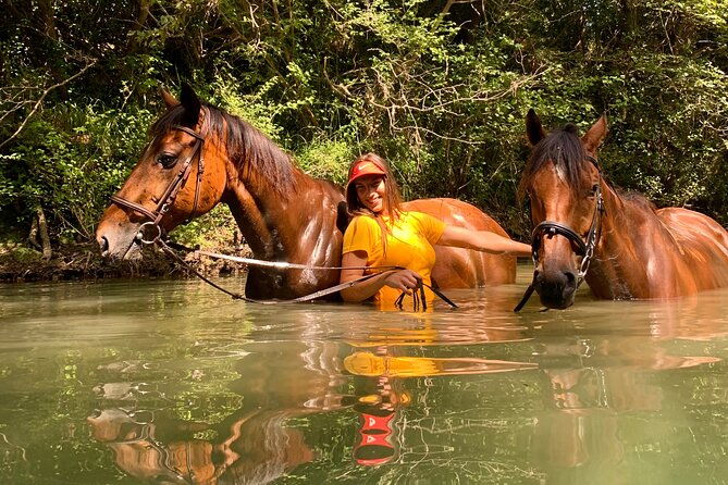 horseback-riding-across-river-ljuta-with-transport