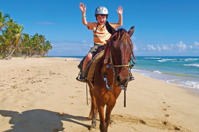 horseback-riding-along-the-beach