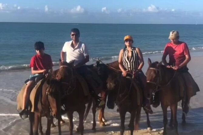 horseback-riding-at-hawksbill-beach-in-five-islands-antigua