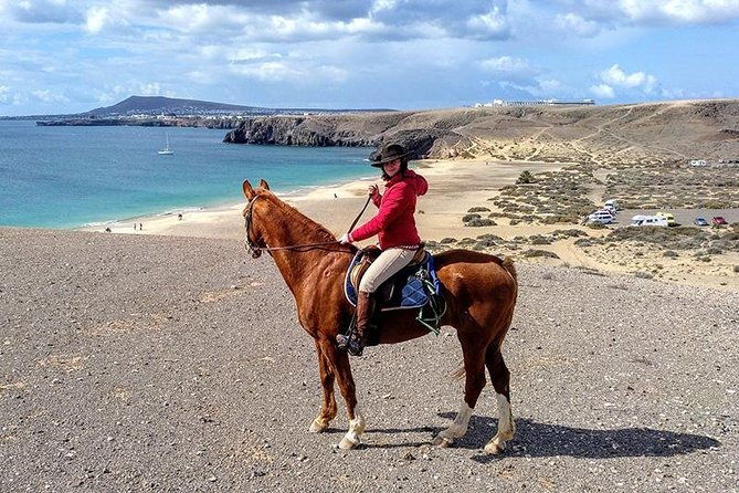 horseback-riding-in-the-sunset-of-famara-beach-lanzarote-spain-2