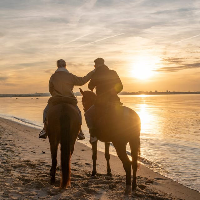 horseback-riding-on-the-beach-at-sunset