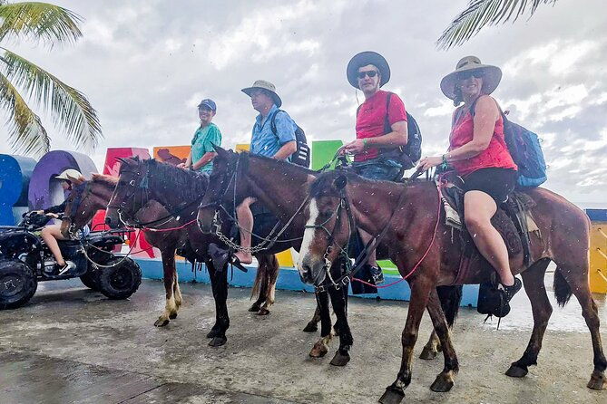 horseback-riding-trail-tour-roatan-letters-and-ocean-in-flowers-bay