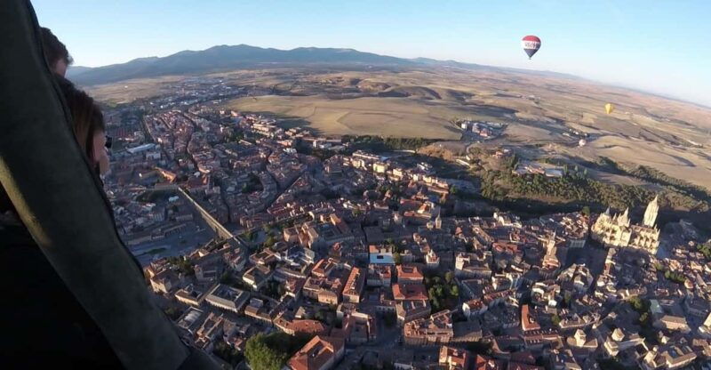 hot-air-balloon-over-segovia-hop-onhop-off-touristic-bus