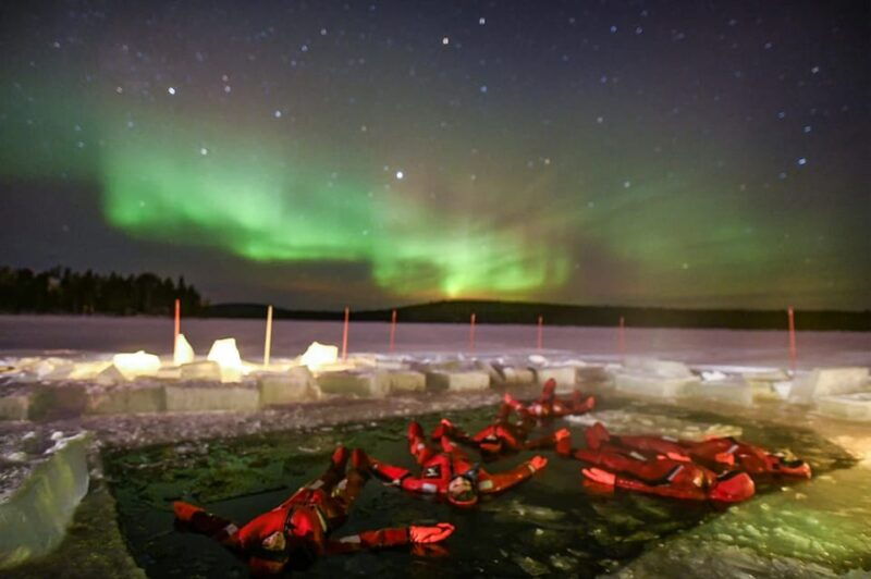 ice-floating-in-lapland-with-northern-lights