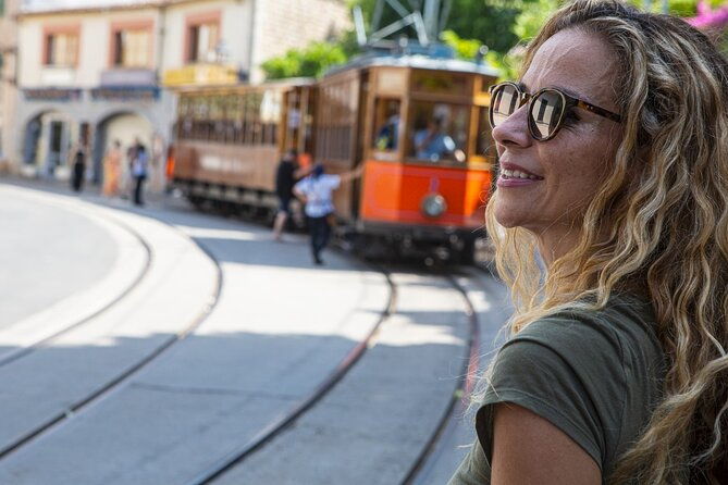 island-tour-with-train-tram-boat-and-bus-from-cala-millor