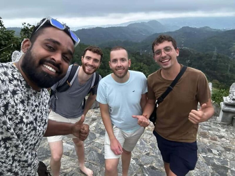 Kandy: Colonial History, War Cemetery & Royal Gardens Tour - Exploring the Royal Botanical Gardens