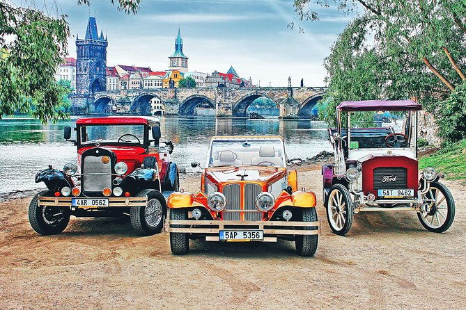 karlstejn-castle-in-vintage-convertible-car-2