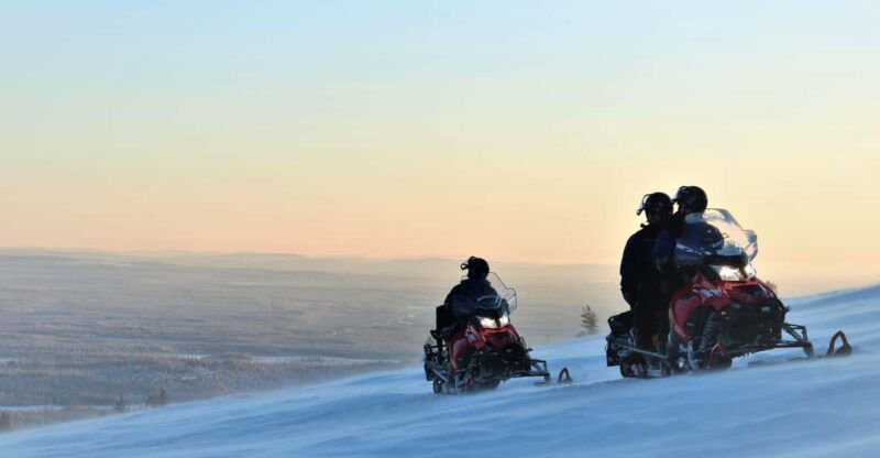king-of-yllas-snowmobiling-to-the-hill