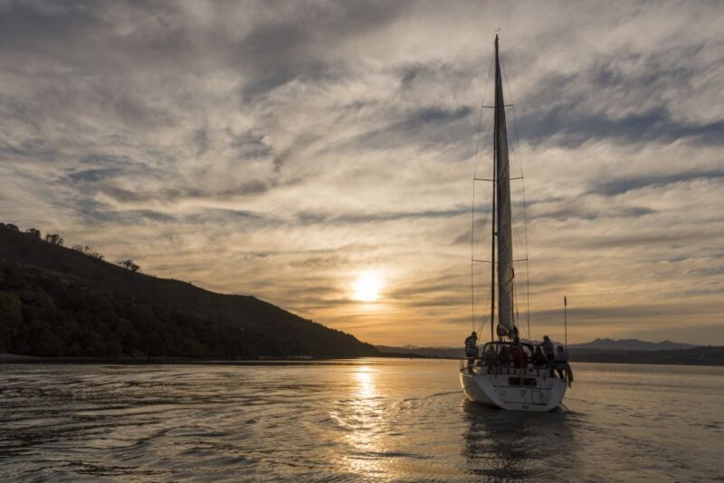 Knysna Sunset Sailing Cruise with Light Dinner and Wine - Key Points