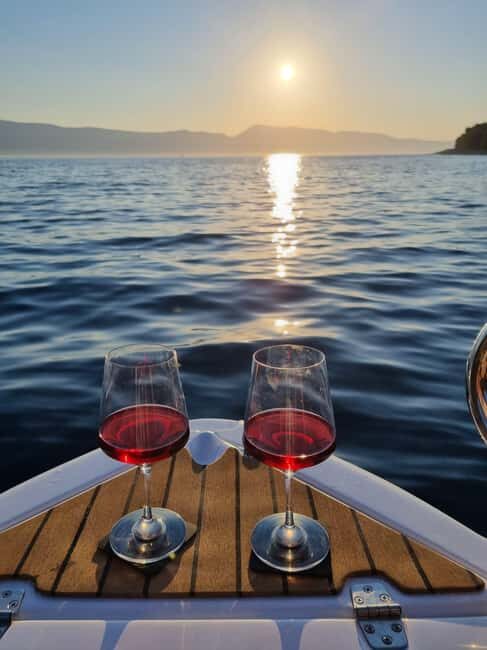 Krk: Sunset Boat Tour with wine, high chance of dolphins - The Experience in Detail