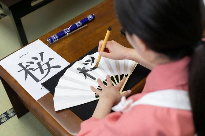learning-zen-of-japanese-calligraphy-in-kimono-near-osaka-castle
