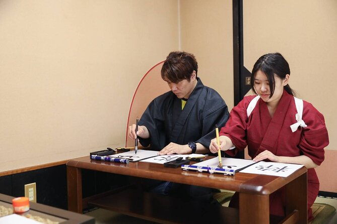 learning-zen-of-japanese-calligraphy-in-kimono-near-osaka-castle