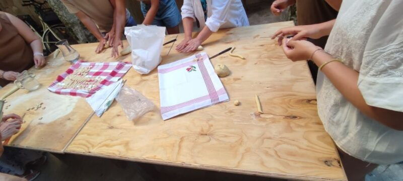 lecce-pasta-making-class-in-1400s-era-courtyard-with-wine