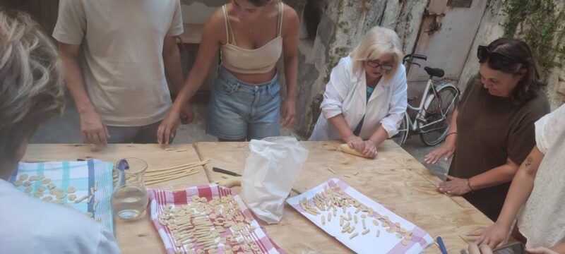 lecce-pasta-making-class-in-1400s-era-courtyard-with-wine