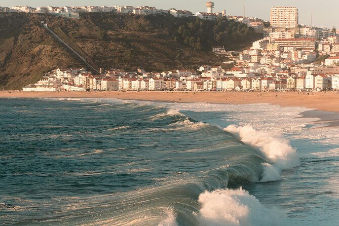 lisbon-8h-tour-to-nazare-obidos-alcobaca-church-incl