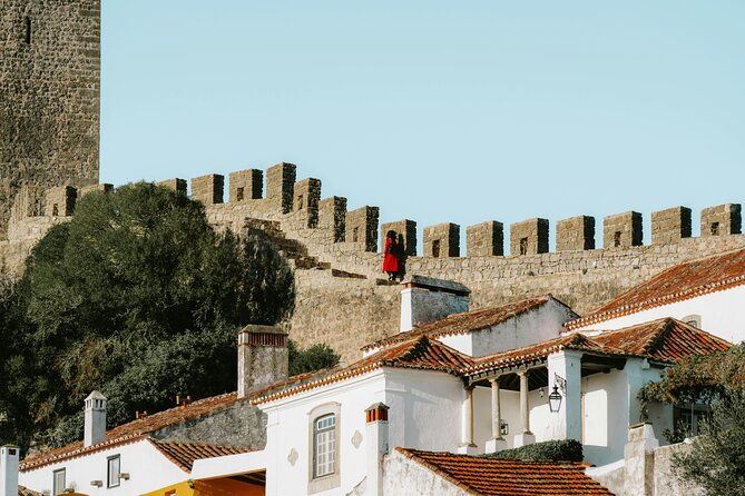 lisbon-8h-tour-to-nazare-obidos-alcobaca-church-incl