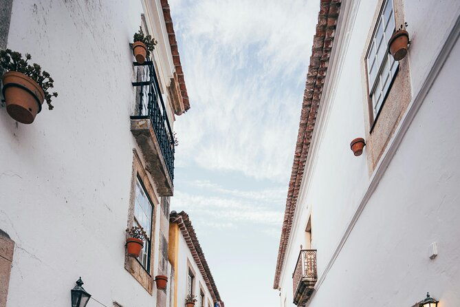 lisbon-8h-tour-to-nazare-obidos-alcobaca-church-incl