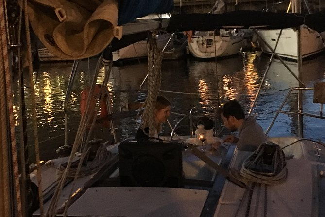 lisbon-by-night-sailing-tour-with-white-or-rose-wine-light-snacks