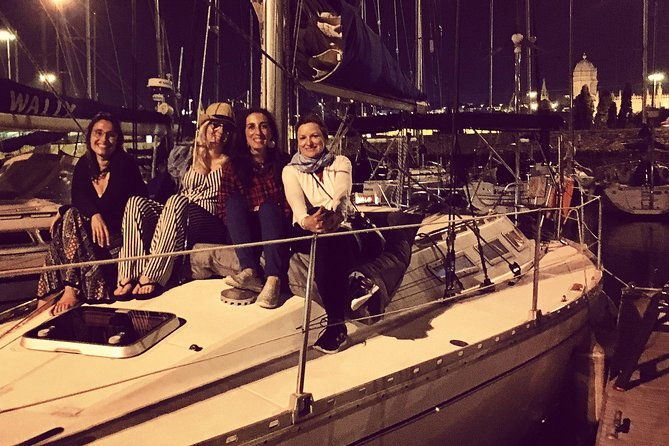 lisbon-by-night-sailing-tour-with-white-or-rose-wine-light-snacks