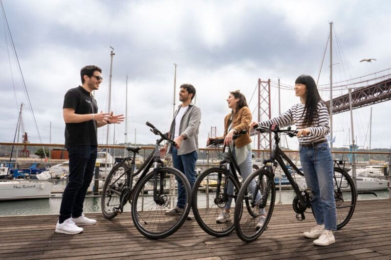 lisbon-guided-bike-tour-helicopter-flight-and-boat-trip
