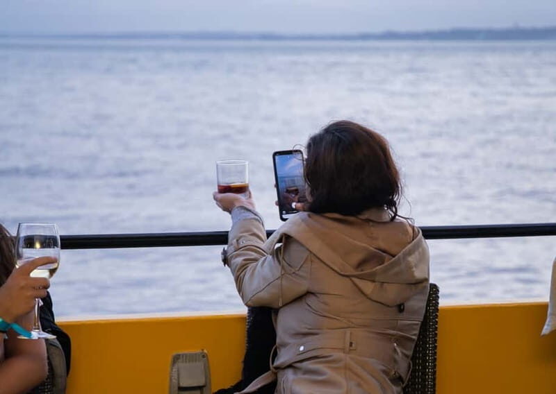 Lisbon: Sunset River Cruise With Drink & Snack - Key Points