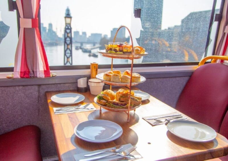 london-afternoon-tea-bus-with-a-glass-of-prosecco
