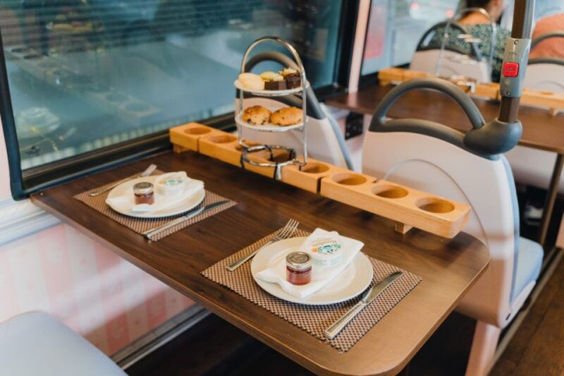 london-afternoon-tea-bus-with-a-glass-of-prosecco