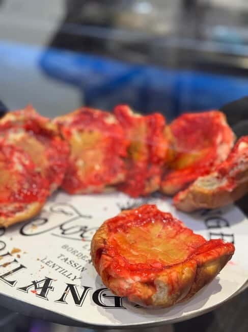 Lyon: Halles Paul Bocuse Lunchtime Food Tour with Tastings - The Markets Atmosphere