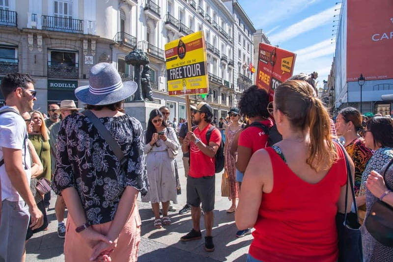 Madrid Essential Walking Tour with Churros, Drink & Market - Key Points