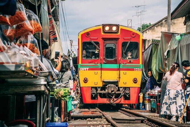 Maeklong Railway & Damnoen Saduak Floating Market Tour Full Day - Exploring the Itinerary in Detail