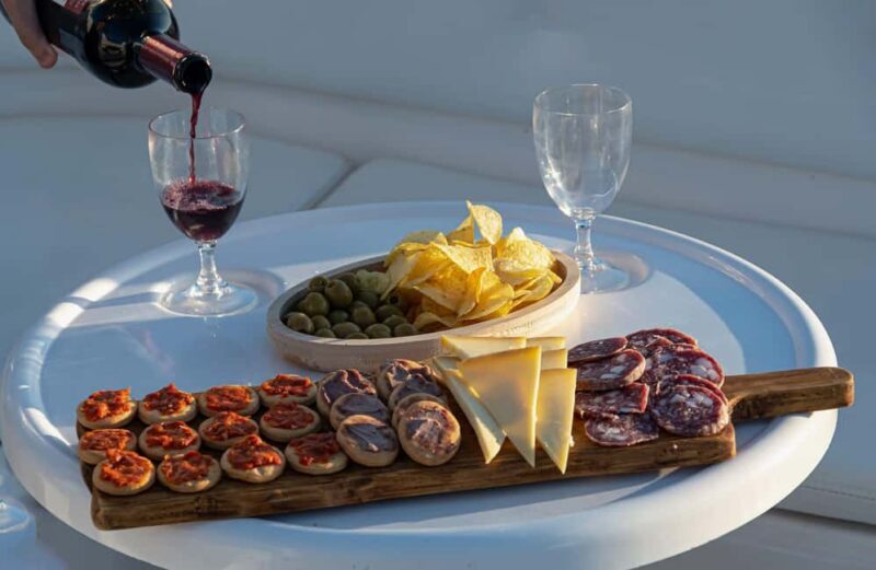 Mahón Menorca: Private boat tour with aperitif and sunset. - An Authentic Menorca Marine Adventure