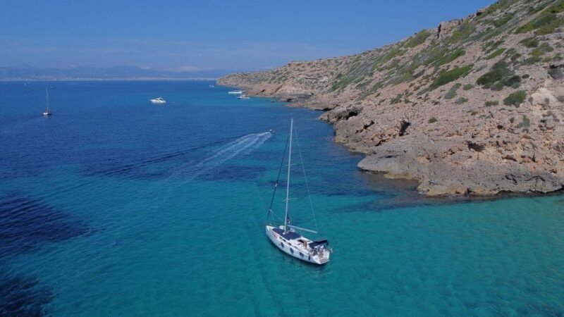 Mallorca Boat Tour with Swim, Cliff Food, & Drinks - Authentic Experiences and Traveler Feedback