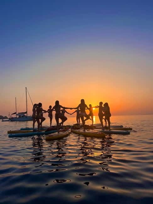Malta: Gnejna Bay Sunset Paddleboarding and SUP Yoga - Key Points