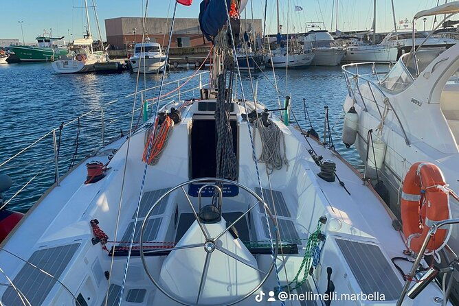 marbella-sunset-from-a-sailboat-with-drinks
