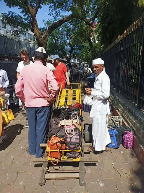 Meet Dabbawalas Visit Dhobi Ghat and Slum with Train Ride - Exploring Mumbai’s Iconic Life: What You Can Expect