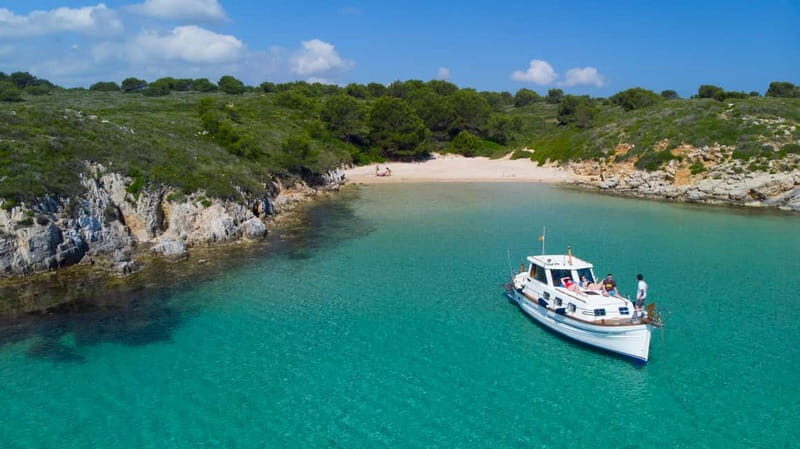 Menorca: Llaut Boat Cruise with Local Appetizers - Authentic Menorcan Appetizers and Refreshments
