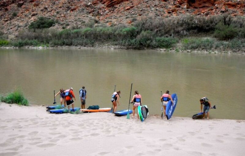 moab-stand-up-paddleboard-with-small-rapids-on-colorado