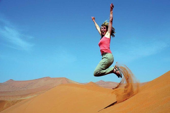 Morning Dubai Red Dunes Safari with Camel Riding & Sand Boarding - Return to Dubai