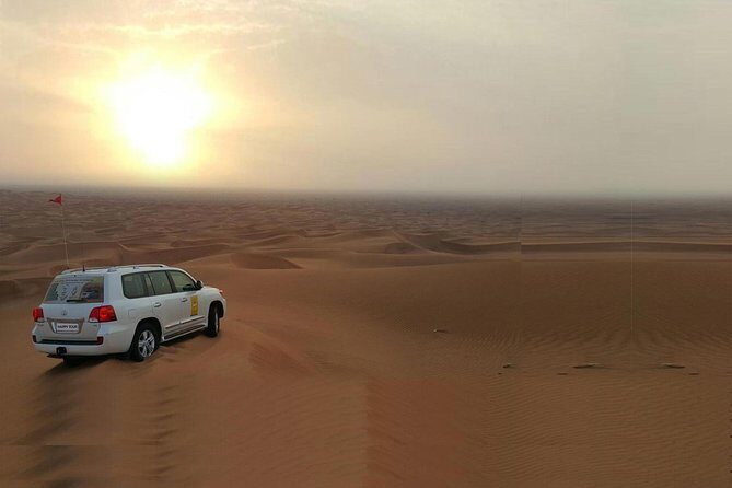 Morning Dune Bashing With Sand Boarding And Camel Ride in Red Dunes Desert - Experience the Red Dunes: A Practical and Thrilling Desert Tour in Dubai