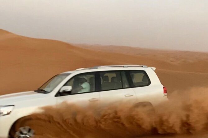 Morning Red Dune Safari with Sandboarding and Camel Ride - Key Points
