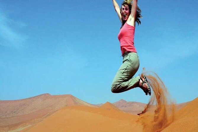 Morning Red Dunes Safari: Camel Ride & Sandboarding Adventure - Return and Drop-Off