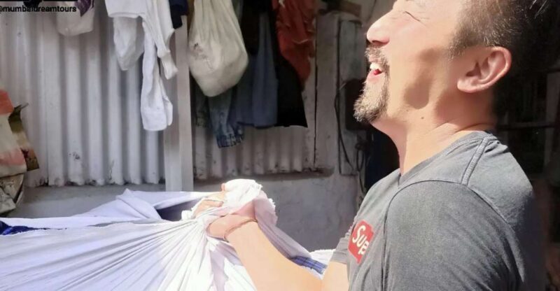 Mumbai: Dhobi Ghat Tour with Dharavi and Train Ride Options - What is the Dhobi Ghat Tour?