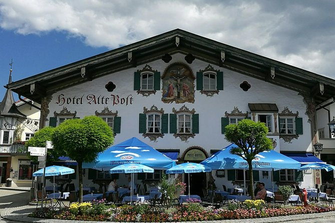 munich-private-car-walking-tour-incl-bmw-world-river-surfers
