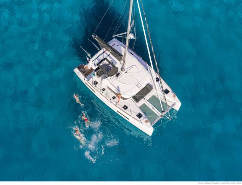 Mykonos: Private Catamaran Cruise w/ Food, Drinks & Transfer - Key Points