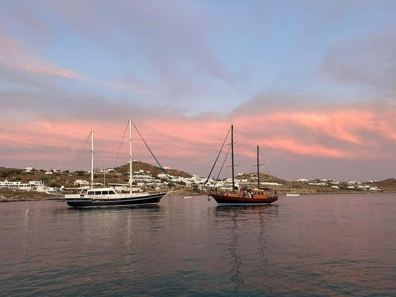 Mykonos: Sunset Boat Cruise with Light Dinner & Drinks - The Sum Up
