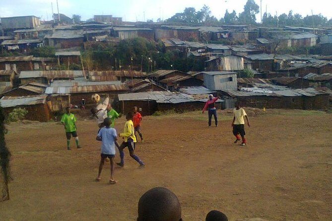 Nairobi Guided Tour to Kibera Slums - Transportation, Timing, and Group Size