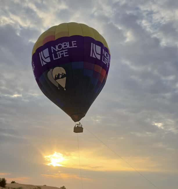 Noble Life Sunrise Hot Air Balloon Ride Over Dubai Desert - Key Points