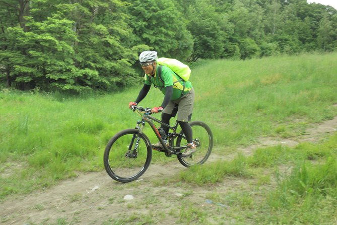 nopporo-forest-mountain-bike-tour-from-sapporo-presenting-a-retro-cycle-cap