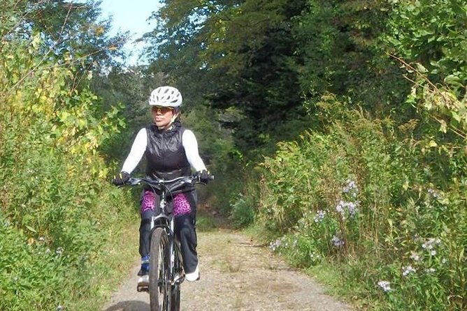 nopporo-forest-mountain-bike-tour-from-sapporo-presenting-a-retro-cycle-cap
