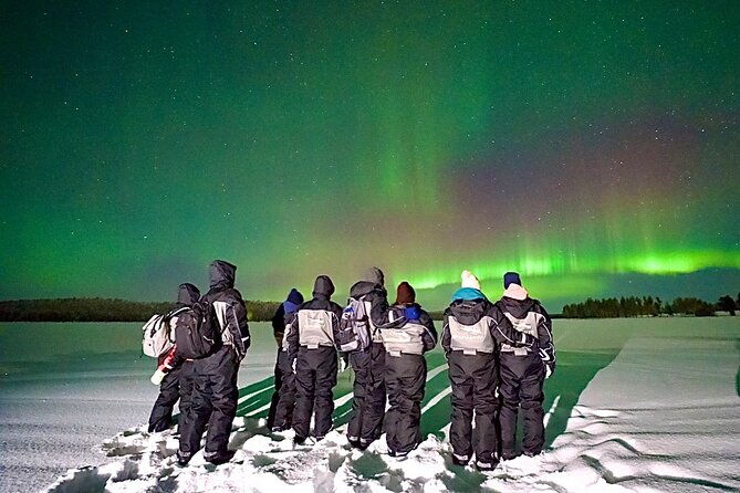 northern-lights-activity-snowmobile-driving
